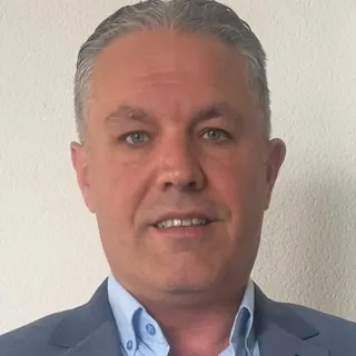 Chauffeur van TaxiUT